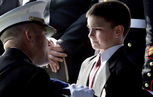 Marine Presenting Flag to Young
          Son.jpeg